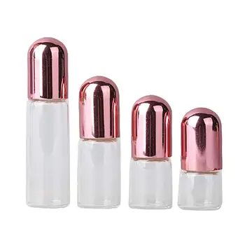 10 vienetų rinkinys eterinių aliejų ritinėliai su rožiniais dangteliais eteriniams aliejams Nešiojami daugkartinio užpildymo mini tuščio stiklo ritinėliai ant butelių