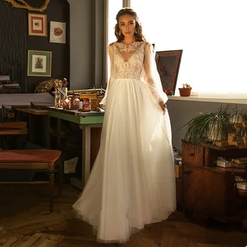 Romantiškos nėrinių tiulio rankovės Bohemijos vestuvinė suknelė 2020 Seksualios skaidrios Boho vestuvinės vestuvinės suknelės su traukinio chalatu De Mariee